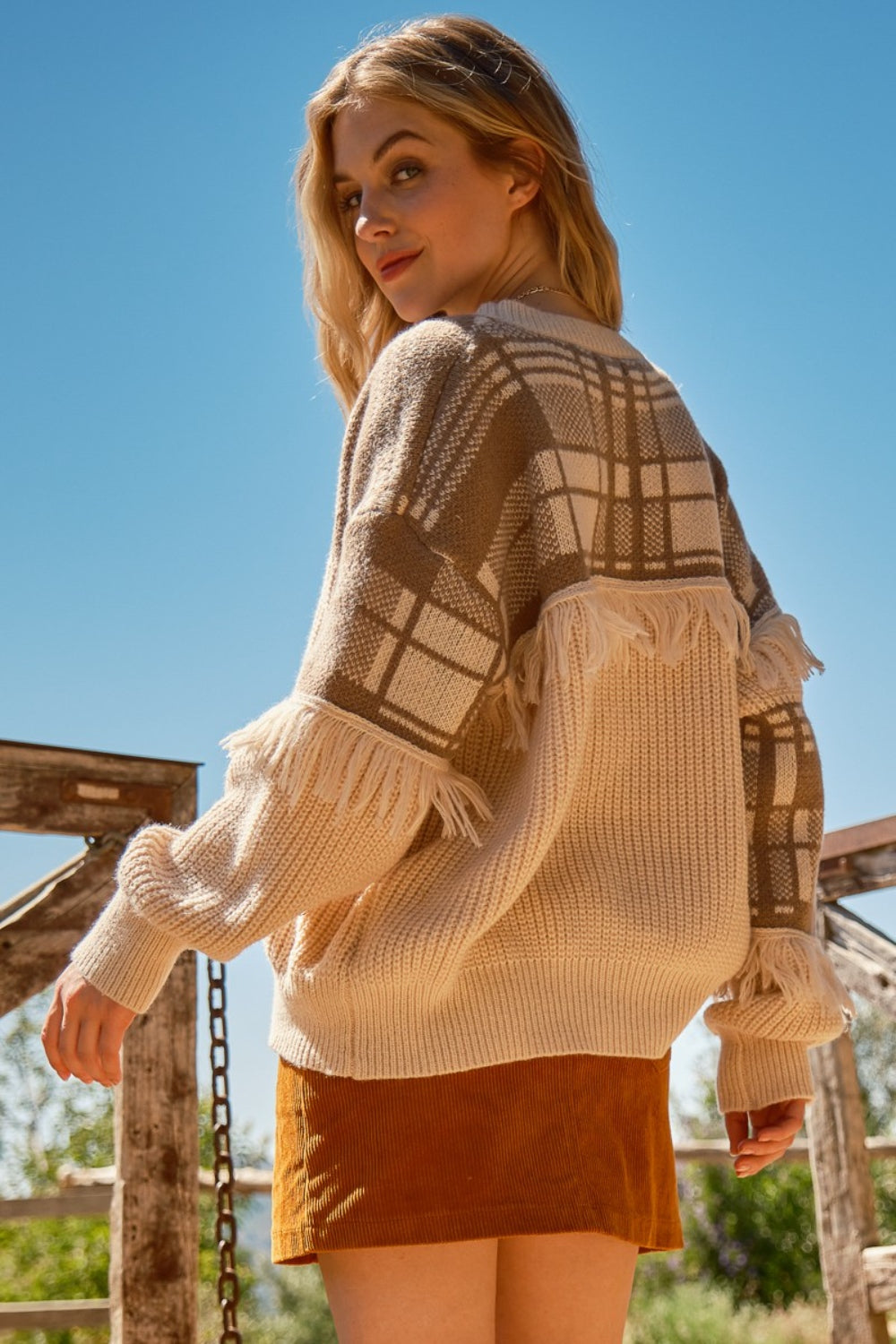 cozy campfire fringe sweater