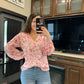 pink floral blouse