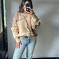 cozy campfire fringe sweater